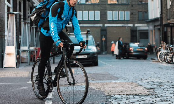 stuart rider on a bicycle