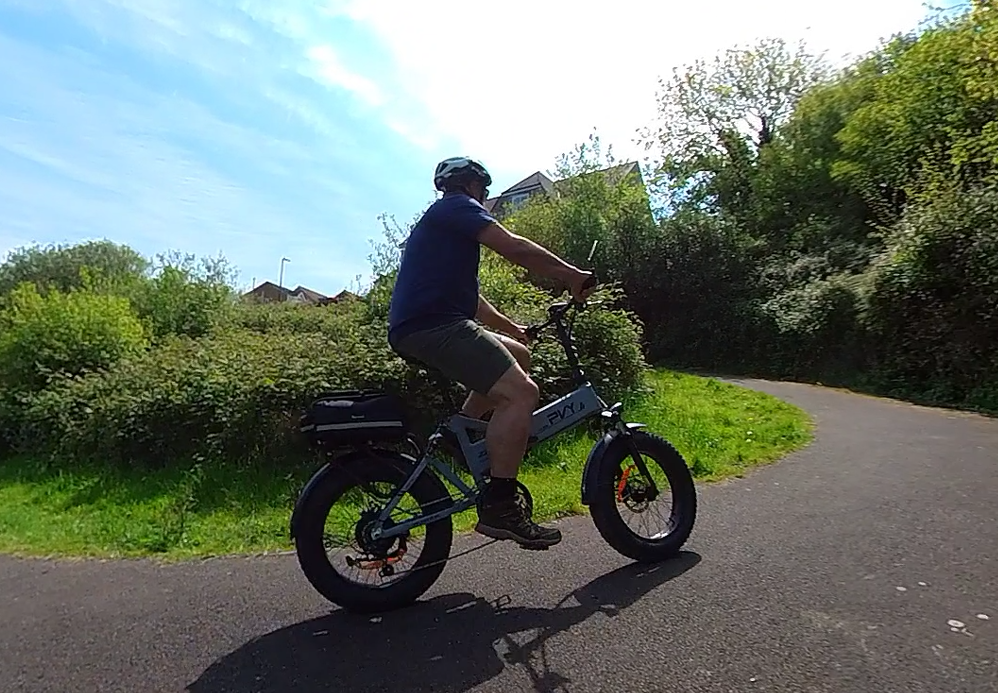 riding an e-bike uphill
